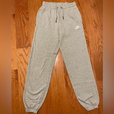 Grey Nike Sweatpants Hardly Worn And Like Brand New Gray Sweatpants Nike, Nike Casual Full-length Joggers, Nike Casual Full-length Pants, Nike Casual Full Length Pants, Nike Sweatpants For Loungewear, Nike Jogger Trousers For Loungewear, Nike Casual Pants With Elastic Waistband, Casual Nike Pants With Elastic Waistband, Nike Bottoms With Pockets For Loungewear