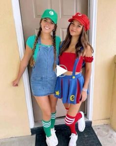 two girls dressed up as super mario and luigi in front of a door with their arms around each other