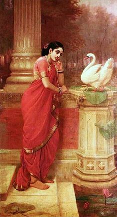 a woman in a red sari standing next to a white swan on a ledge