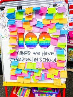 a bulletin board with post it notes on it that says things we have learned in school