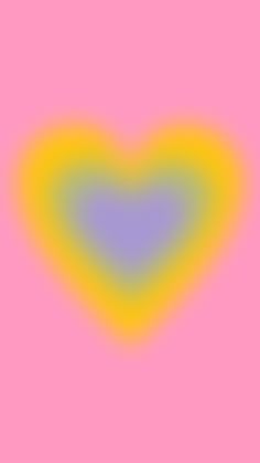 an image of a heart on a pink background with yellow and blue colors in the middle