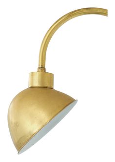 an antique brass wall light on a white background