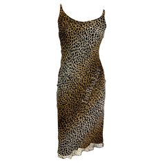 Presenting a beautiful ombre cheetah print Dolce and Gabbana slip dress. From the mid-1990s, this dress features a wide scoop neckline and thin straps. The dress is made complete with a thin chiffon overlay. Approximate measurements: Size - IT40 Bust: 34 - 36" Waist: 30 - 34" Hips: 34 - 40" Shoulder to hem: 45" 100% Silk Types Of Corsets, Metal Corset, Vintage Corset Dress, Daisy Jones, Vintage Corset, Chiffon Overlay, Corset Belt, Stripped Dress, Fame Dr