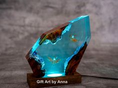 Avatar Epoxy Resin Lamp, Avatar: Frontiers of Pandora, Ilu Avatar 2 Way of the Water, Ocean Resin Lamp Optional Size: M Size: 6.7x5.2 inches L Size: 7.8x6.0 inches XL Size: 9.2x6.9 inches (0.2-0.4 inches error - Size includes wooden base) The product is equipped with remote-controlled RGB LED lights, providing 16 different lighting modes. The LED lights are CONTINUOUSLY powered via the included USB charging port. The remote control does not include batteries due to air transport policy, you need to purchase CR2025 or CR2032 batteries separately. Avatar 2 Resin Lamp Inspired by the upcoming movie Avatar 2, our lamp features two people riding on the back of an ilu, a majestic underwater creature often used for transportation. The handmade lamp is a decoration, acting as a unique table lamp t Ilu Avatar, Epoxy Resin Lamp, Lamp Inspired, Frontiers Of Pandora, Unique Table Lamp, Handmade Lamp, Ocean Resin, Unique Table Lamps, Resin Lamp