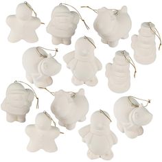 twelve white ceramic ornaments with gold trimmings