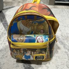 Brand New Disney Beauty And The Beast Backpack Disney Style Backpack With Zipper Closure, Disney Backpack With Adjustable Strap, Disney Travel Backpack, Disney Backpack For Daily Use, Disney Style Backpack For Travel, Disney Themed Standard Backpack For Theme Park, Daily Use Disney Backpack, Themed Travel Backpack Bags, Disney Travel Backpack With Zipper Closure