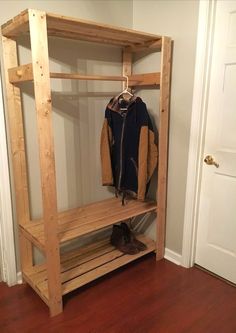 a coat rack in the corner of a room