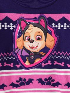 a purple sweater with a cartoon dog on it