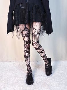 This price is for a pair of tighs only. Edgy Stretch Fishnet Tights, Edgy Stretch Fishnet Legwear, Edgy Fitted Fishnet Tights, Black Fishnet Legwear For Spring, Spring Black Fishnet Legwear, Spring Fishnet Legwear In Black, Gothic Stretch Fishnet Legwear, Gothic Fishnet Stretch Legwear, Gothic Stretch Fishnet Hosiery