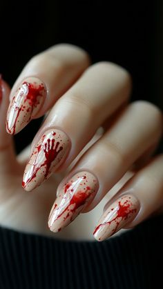 Unleash your spooky side with these chilling Bloody Handprint nails! Perfect for a frightfully fabulous Halloween look, this design adds a touch of gore to your manicure. Click to explore more and follow us for more terrifyingly trendy nail ideas! #HalloweenNails #BloodyNails #SpookyManicure #NailArt #FrighteningNails Blood Splatter French Tip Nails, Short Blood Splatter Nails, Insidious Nails, Art The Clown Terrifier Nails, Red Rum Nails, Halloween Blood Splatter Nails, Halloween Nails Gory, Scary Nails Halloween, Scary Nails Designs