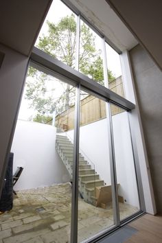 Minimally framed sliding glass doors Basement Entrance, Basement Lighting, Floor Renovation, Basement Renovation, Glass Extension, Rear Extension