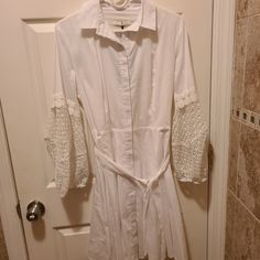 Unique White Dress Nwt Long Sleeves With Lace Design Button Down Collar Tie Belt Sz M From Smoke Free And Pet Free Home. There Is A Small Blemish On The Right Sleeve (See Photos) Bundle And Save! Offer’s Accepted. Elegant Cotton Mini Dress With Button Closure, White Dress With Button Cuffs For Day Out, White Dresses With Button Cuffs For Day Out, Elegant Cotton Button-up Mini Dress, Elegant Button-up Cotton Mini Dress, Elegant Cotton Mini Dress With Buttons, Buttoned Knee-length Shirt Dress For Brunch, Knee-length Buttoned Shirt Dress For Brunch, Elegant Buttoned Shirt Dress For Brunch