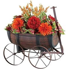 a wagon filled with lots of flowers on top of a white background