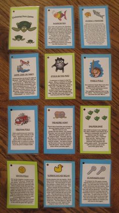 several cards with pictures of different animals and words in them on a wooden table top