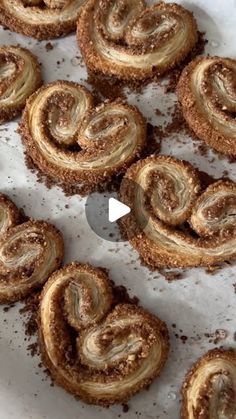 several pastries sitting on top of a white plate