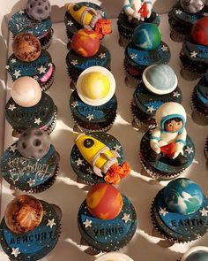 cupcakes in the shape of rockets and planets