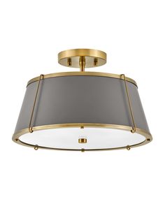 a light fixture with a grey shade on the bottom and gold trim around the top