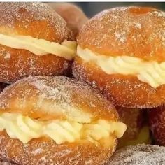 some very tasty looking doughnuts that are stacked on top of each other