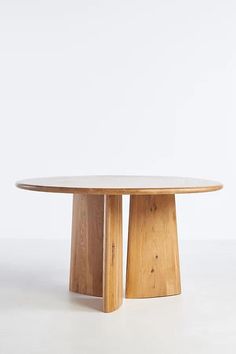 a round wooden table with two legs and a circular top, on a white background