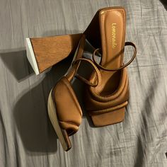 Brown Geometric/ Triangular Heels. Never Worn. Size 6.5. Beige Loafers, Casual Formal Dresses, Black Patent Heels, Swim Shoes, Distressed Black Jeans, Peep Toe Heels, Heeled Loafers, Leather Pumps, Leather Loafers