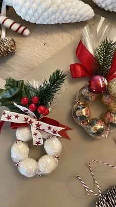 christmas decorations and ornaments on a table