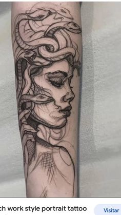 a woman's face with snakes on her arm and the other part of her head