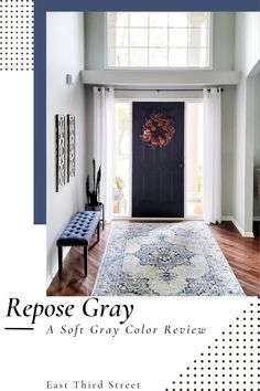 a white and blue rug in front of a black door with the words repose gray on it