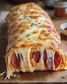 a cheesy pizza roll with pepperoni and cheese