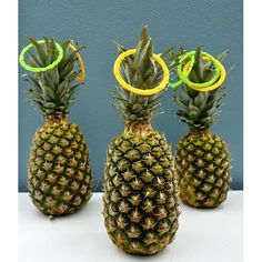 three pineapple ring tosses are sitting on top of each other