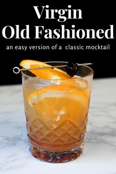 an old fashioned cocktail is garnished with orange slices