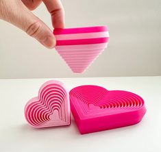 Here is a fidget toy you are sure to love ❤ The small heart would be a perfect toy for a valentine exchange in school:) These are digital files only. Purchase includes STL file for:  (1) Large Heart Layered Fidget   (2) Small Heart Layered Fidget 3D PRINTING SETTINGS: Layer Height 0.2mm PLA works great 15-20% Infill  Dimensions of Large Heart Layered Fidget: 4in x 4in x 7/8in Dimensions of Small Heart Layered Fidget: 2 3/8in. X 2 3/8in. X 7/8in. You could scale up on these but I would caution about scaling down too much because that will make the walls thinner and decrease the spacing between the layers resulting in a less satisfying fidget. Have fun printing:) Kindergarten Valentine Party, Cool 3d Prints, 3d Printing Toys, Kindergarten Valentines, Drukarka 3d, 3d Printing Art, 3d Printer Designs, 3d Printing Diy, 3d Printing Projects