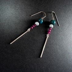 Earrings from the SZAMANKA collection with ruby, apatite, howlite and silver. Length of earrings with hook: 8 cm. Earrings handmade according to my own design in the Anillo studio. We send the jewelry in an elegant box. Jewelry for free and independent women who draw strength from nature and the energy of their ancestors :) Positive People, Calming Stones, Independent Women, Box Jewelry, Earrings Handmade, Diy Jewelry, Jewelry Earrings Dangle, Poland, Dangle Drop Earrings