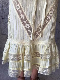 "Very rare Mexican dress, definitely a unique piece. zipper up. Made in 1970's Light Yellow pintuck cotton, you can see through it. Gorgeous details with lace. Fits size Small Measurements taken flat: Armpit to Armpit 18 1/4\" Waist 15\" HIps 19\" Bottom hem width 33 1/2\" Shoulders to bottome hem 50 1/2\"" Traditional Long Summer Dresses, Bohemian Maxi Dress For Daywear, Bohemian Wedding Dress With Chikankari Embroidery, Cream Bohemian Dress With Lace Patchwork, Traditional Fitted Lace Maxi Dress, Bohemian Maxi Dress With Lace Trim, Bohemian Long Maxi Dress With Lace Trim, Maxi Length Boho Dress With Lace Trim, Summer Lace Dress With Chikankari Embroidery