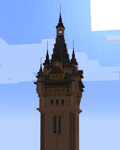 a very tall tower with a clock on it's side and sky in the background