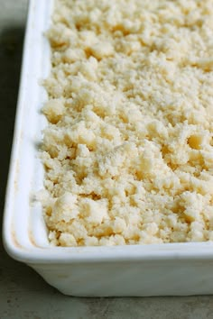 a casserole dish with crumbs in it