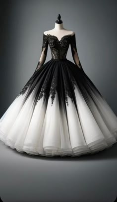 a black and white ball gown with long sleeves