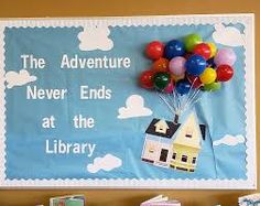 there is a sign that says the adventure never ends at the library and balloons are in the air