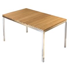 a wooden table with metal legs on a white background