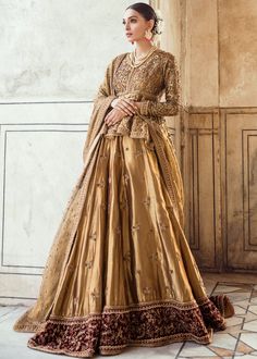 Pakistani Bridal Lehnga Shirt in Golden Color for Wedding in Stylish Design decor with beautiful embroidery. Available with Fast Delivery in USA. Pakistani Bridal Dress, Bridal Lehenga Designs, Pakistani Couture, Couture Bridal, Traditional Bride, Pakistani Bridal Dresses, Bridal Dress Design, Lehenga Designs, Pakistani Bridal