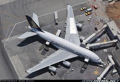 an airplane is parked on the tarmac