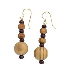 With this pair of dangle earrings Ghanaian designer Rita Addo Zakour invites you to enjoy the beautiful grain of sese wood. She alternates wood beads with petite beads of plastic that is recycled from bottles suspended from brass hooks. Wood Beads Earrings, Wooden Beads Jewelry Handmade, Wooden Bead Earrings Diy, Wooden Beaded Earrings, Wood Beaded Earrings, Wood Bead Earrings Diy, Wooden Beads Earrings, Wood Jewellery Handmade, Wood Earrings Diy