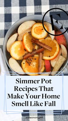 a bowl filled with fruit and cinnamons on top of a checkered table cloth