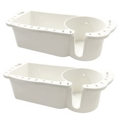 two white plastic containers sitting next to each other