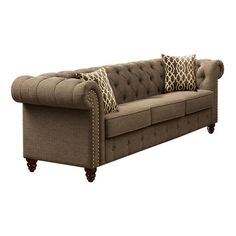 an image of a couch with pillows on the armrests and back cushiones