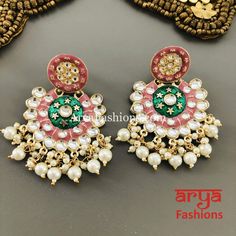 Mahi Meenakari Kundan Chandbali with Pearls Premium Quality Kundan Meenakari Chandbali Earrings Length: Approx. 2.75" Light-weight Push-Back closure Gold Finish on high-quality brass as the base metal, Kundan stones and Pearls Suitable for any traditional for contemporary attire and occasion In-stock & ready-to-ship **Color may vary slightly due to photography and lighting. Luxury Meenakari Danglers For Formal Events, Luxury Meenakari Chandbali Danglers, Luxury Blue Chandbali Jewelry, Luxury Kundan Meenakari Danglers, Bridal Meenakari Chandbali Kundan Earrings, Luxury Bridal Meenakari Earrings For Festivals, Pink Meenakari Chandbali Earrings, Diwali Meenakari Chandbali Pearl Earrings, Kundan Meenakari Chandbali Pearl Earrings