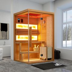 a bathroom with a sauna in the middle