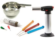 an assortment of medical supplies and tools on a white background