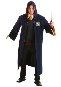 a man dressed as harry potter holding a wand