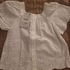 Nwt, White Cotton Embroidered Top. Toddler Girl Size 3-4. Cute White Blouse With Floral Embroidery, White Cotton Tops With Broderie Anglaise, Cute White Tops With Floral Embroidery, Zara Embroidered White Tops, White Embroidered Zara Tops, Cute White Zara Blouse, Zara White Embroidered Tops, Zara White Tops With Broderie Anglaise, Zara White Broderie Anglaise Tops