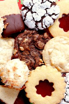 an assortment of cookies and pastries on a plate